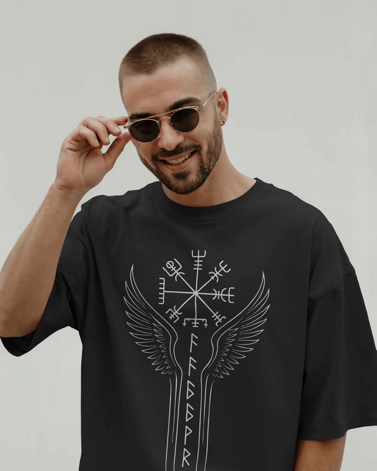 Runic Wings Oversized T-Shirt – Norse Symbolic Streetwear by Bycads