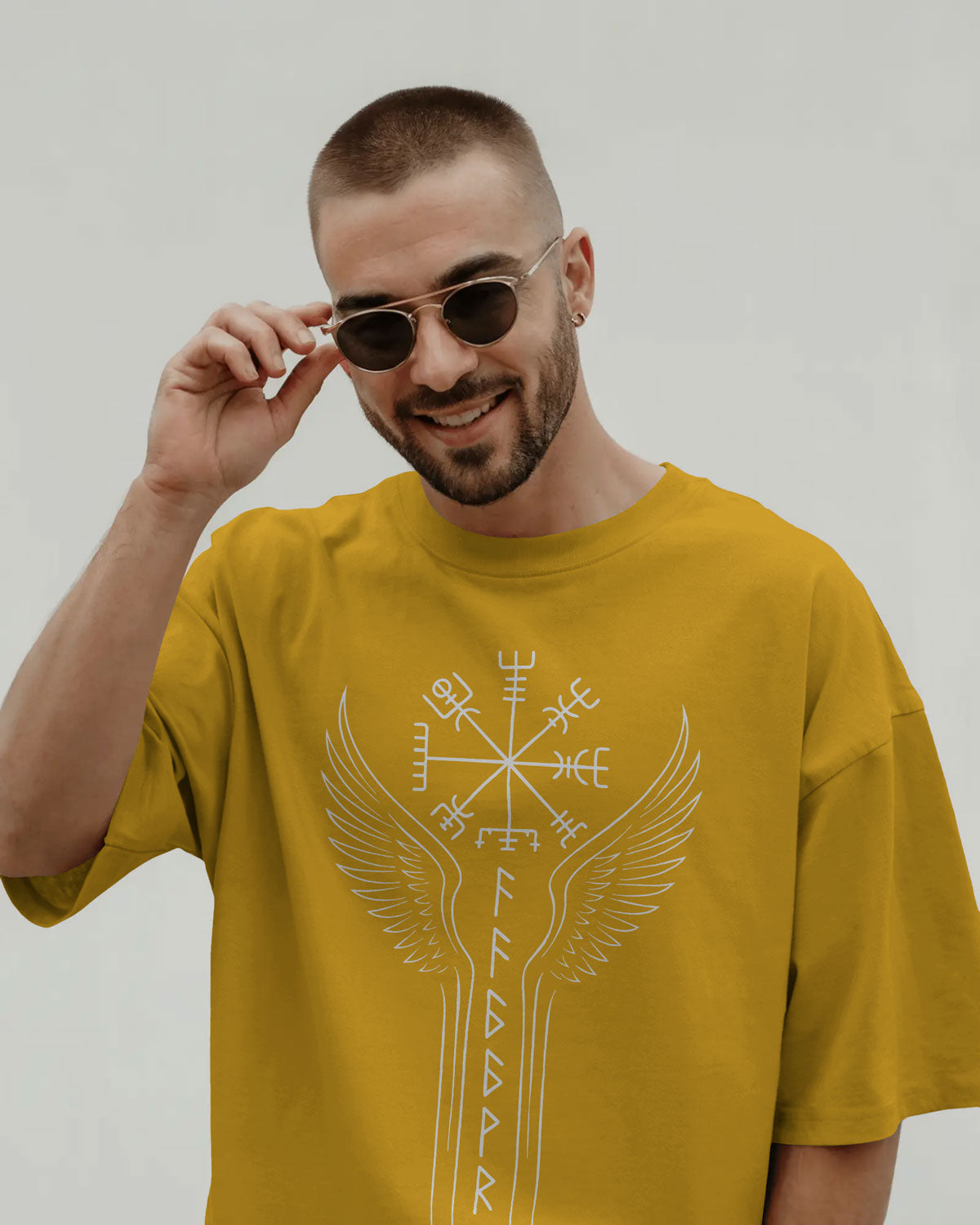 Runic Wings Oversized T-Shirt – Norse Symbolic Streetwear by Bycads